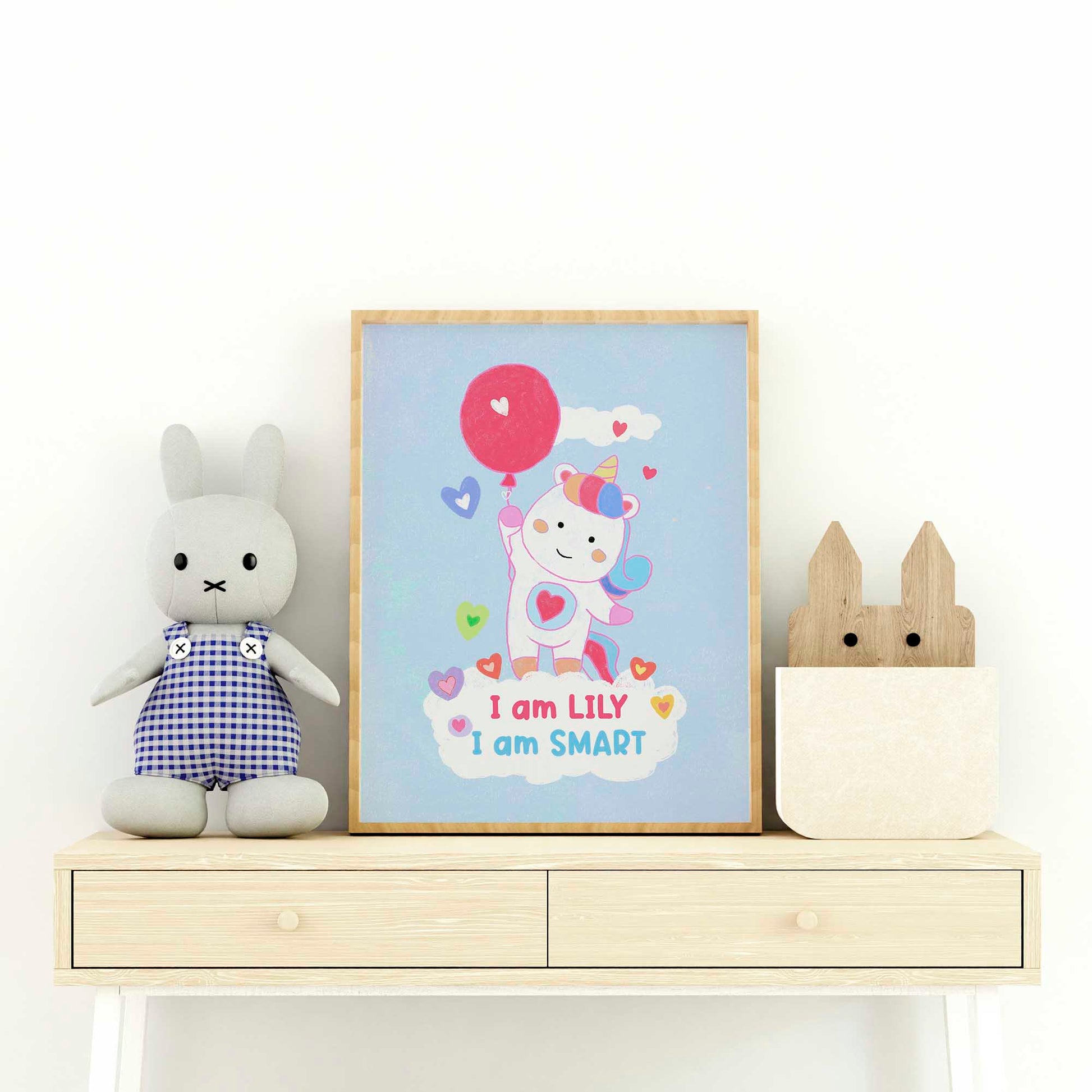 "Girl's nursery enhanced with unicorn framed art, combining kids' wall art with empowering sayings."